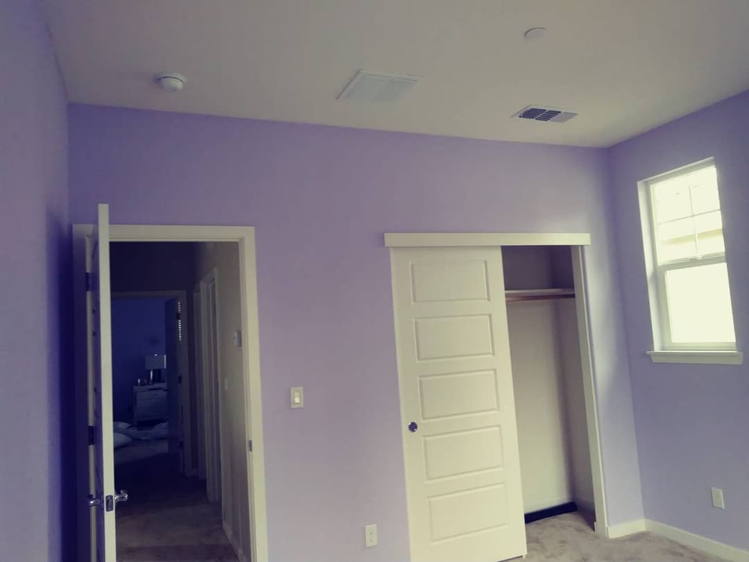 Interior room renovation with fresh paint and finished trim